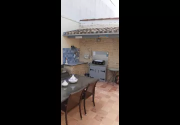 Maison roses trèmières